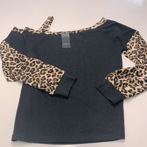 Sheilay top with cheetah print.